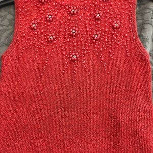 Medium holiday top with sparkly material and beading. NWOT